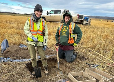 two archaeologists in the field mitigation project